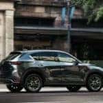 Mazda CX-5 Driving Down City Street